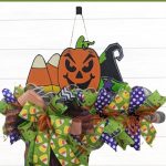 How to Decorate Your Own Halloween Candy Corn Wreath Rail